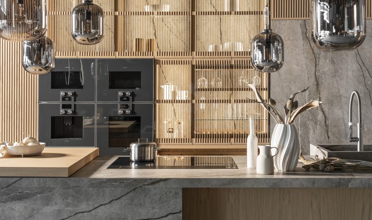 Imperial Oak kitchen collection, inspired by nature, featuring an integrated sintered stone sink, oak island with electric elements, and high cabinetry with built-in appliances.