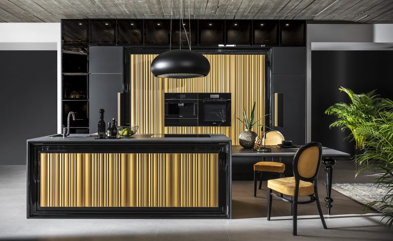 Modern kitchen with luxurious gold wavy fronts from the Ariana Kitchen Collection by MY-SPACE, perfect for a glamorous interior.