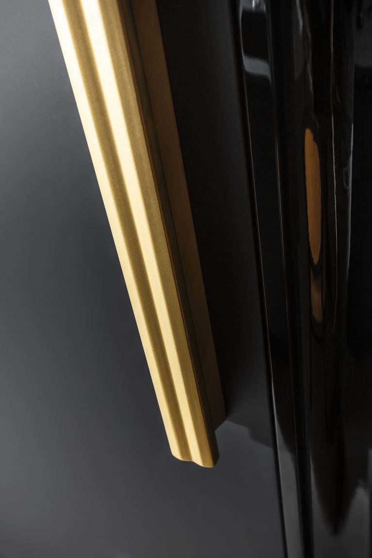 Modern kitchen with luxurious gold wavy fronts from the Ariana Kitchen Collection by MY-SPACE, perfect for a glamorous interior.